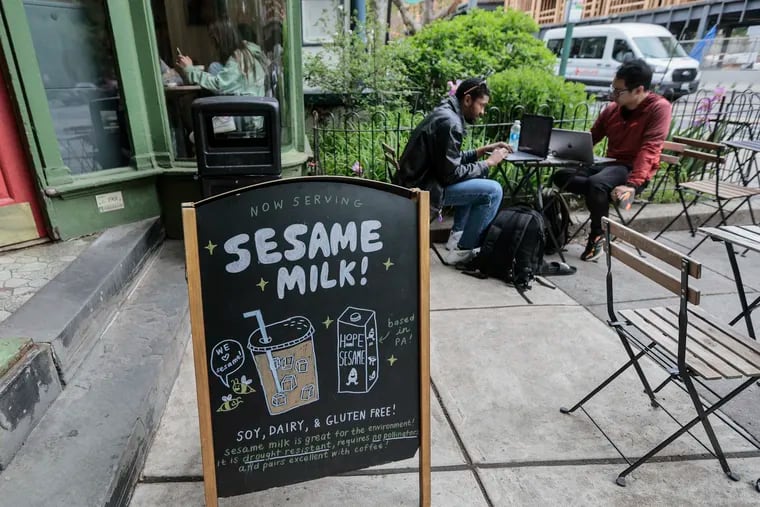 Green Line Cafe, 4239 Baltimore Ave., displays a sign advertising the sesame milk it has begun selling to cater to the growing demand for alternative, environmentally friendly milk.