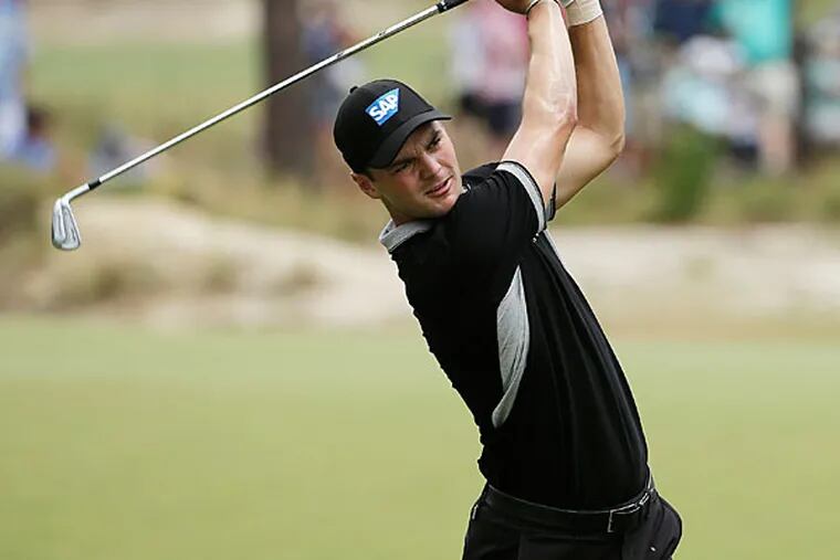 Martin Kaymer, of Germany, watches his tee shot on the seventh hole during the second round of the U.S. Open golf tournament in Pinehurst, N.C., Friday, June 13, 2014. (Chuck Burton/AP)