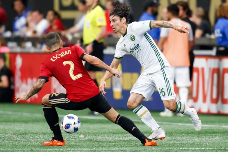 Zarek Valentin (right) will try to help the Portland Timbers upset Atlanta United in the MLS Cup Final on Saturday night at Atlanta's Mercedes-Benz Stadium. The Lancaster native is known not just for his soccer talent, but for his charisma and diehard Philadelphia Eagles fandom.