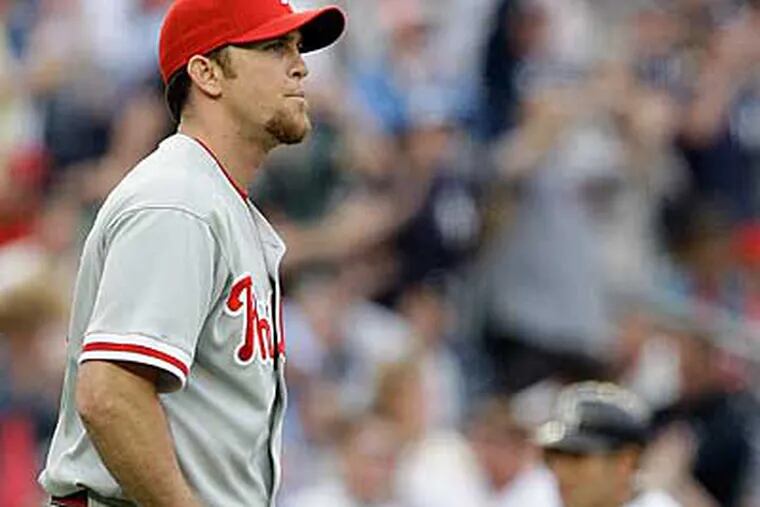 Brad Lidge reacts after surrendering a game-tying home run to Alex Rodriguez during the ninth inning in New York. The Phillies lost the game 5-4. (AP Photo/Frank Franklin II)