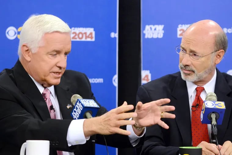Pennsylvania gubernatorial candidates Tom Corbett (left) and Tom Wolf debate October 1, 2014, on KYW Newsradio's "Breakfast with the Candidates." ( TOM GRALISH / Staff Photographer )