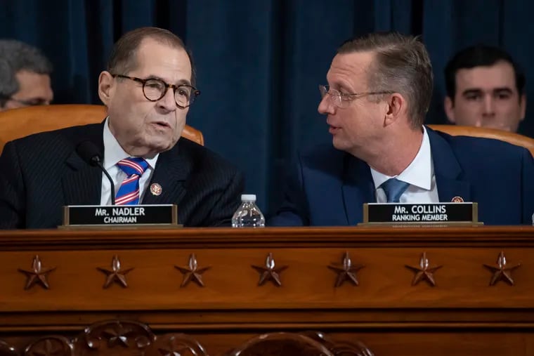 House Judiciary Committee Chairman Rep. Jerrold Nadler, (D., N.Y.), left, talks with ranking member Rep. Doug Collins, (R., Ga.) during a hearing before the House Judiciary Committee on the constitutional grounds for the impeachment of President Donald Trump, on Capitol Hill in Washington Wednesday.