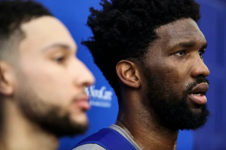 The Sixers' Joel Embiid and his former teammate Ben Simmons speak to the media.