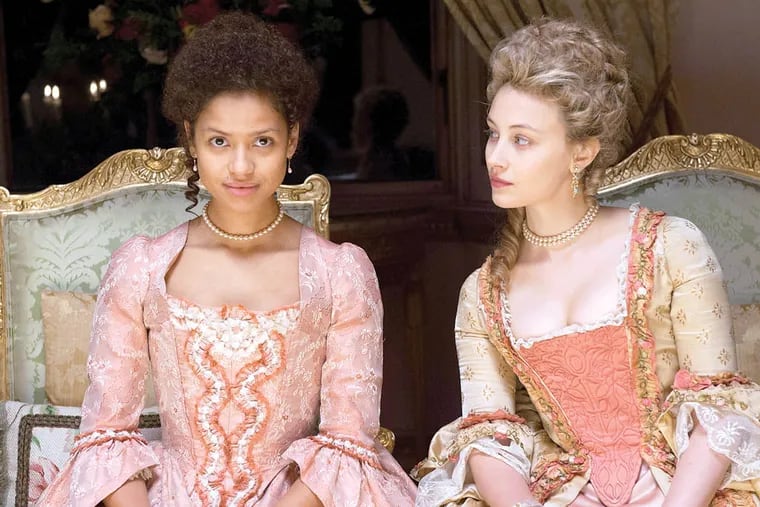 This photo released by Fox Searchlight shows Gugu Mbatha-Raw, left, as Dido Elizabeth Belle and Sarah Gadon as Lady Elizabeth Murray, in a scene from the film, "Belle." (AP Photo/Fox Searchlight, David Appleby)