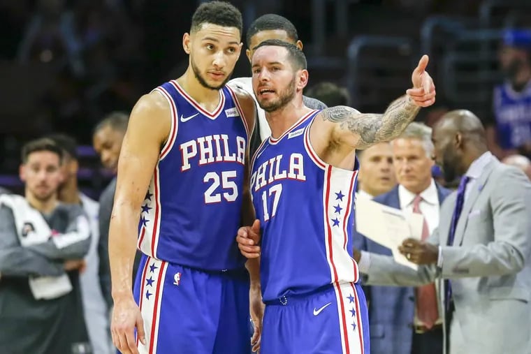 Sixers guard JJ Redick with teammate guard Ben Simmons against the Indiana Pacers on Friday, November 3, 2017 in Philadelphia.