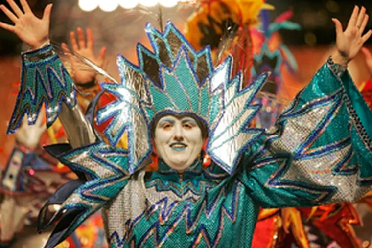 The Fancy Brigades always get, well, fancy during their finale at the Convention Center. The Mummers Parade starts at 9.