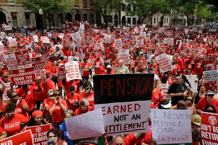 Public-worker union members fill State Street in front of the state Capitol. Gov. Christie reduced the state contribution to their pension plan.