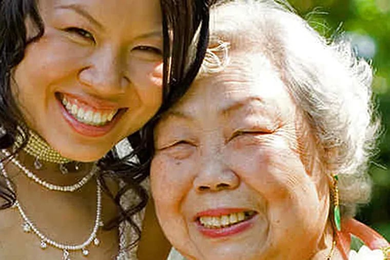 Benita Cooper and her grandmother Mei Chiu. Cooper uncovered the story of Mei Chu's &quot;two mothers.&quot; (Michael Bryant / Staff)