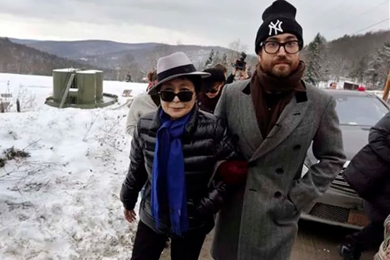 In this file photo of Jan. 17, 2013, Yoko Ono, left, and her son Sean Lennon visit a fracking site in Franklin Forks, Pa., during a bus tour of natural-gas drilling sites in northeastern Pennsylvania. Ono and Lennon have formed a group called ìArtists Against Fracking,î which has become the main celebrity driven anti-fracking organization.  (AP Photo/Richard Drew, File)