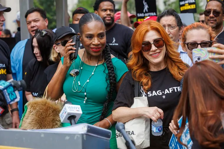 Actors Sheryl Lee Ralph (left) and Lisa Ann Walter, both from "Abbott Elementary," attended the SAG-AFTRA rally in Love Park on Thursday.