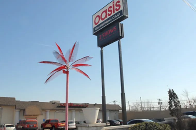 Oasis Gentlemen's Club, at 6800 Essington Ave., was one of two strip clubs searched in the investigation. (April Saul / Staff Photographer)