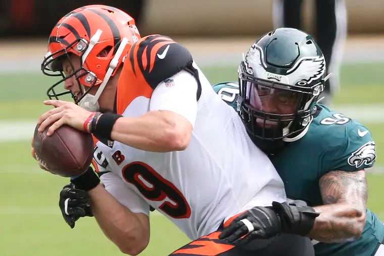 Derek Barnett sacks Cincinnati Bengals quarterback Joe Burrow in a game last season.
