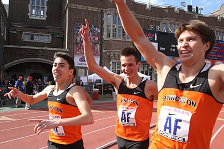 The Princeton distance medley relay team celebrates its Championship of America. (Charles Fox/Staff Photographer)