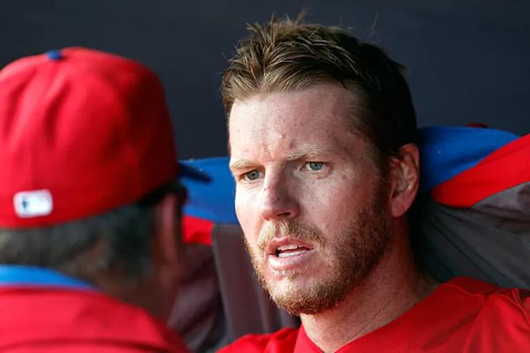 Phillies' Roy Halladay talks with Rich Dubee, left, as the Phillies
play the New York Yankees in a Spring Training game at George M.
Steinbrenner field in Tampa, Fl. on March 1, 2013. ( DAVID MAIALETTI /
Staff Photographer )