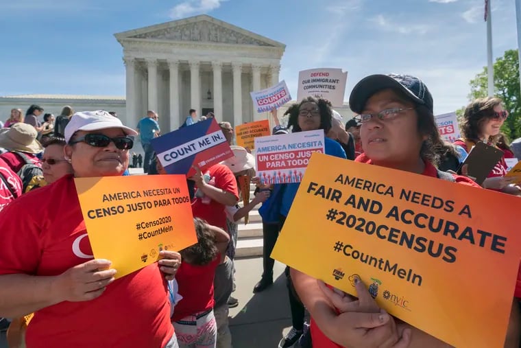 In this April 23, 2019 file photo, immigration activists rally outside the Supreme Court as the justices hear arguments over the Trump administration's plan to ask about citizenship on the 2020 census, in Washington.(AP Photo/J. Scott Applewhite, File)