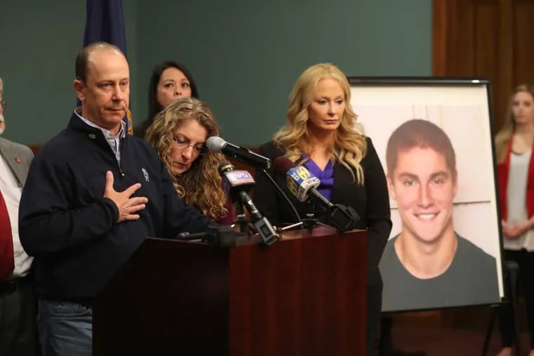 Jim Piazza gives a family statement after Centre County District Attorney Stacy Parks Miller spoke about the Beta Theta Pi hazing investigation at Penn State University and the charges brought against 18 people.