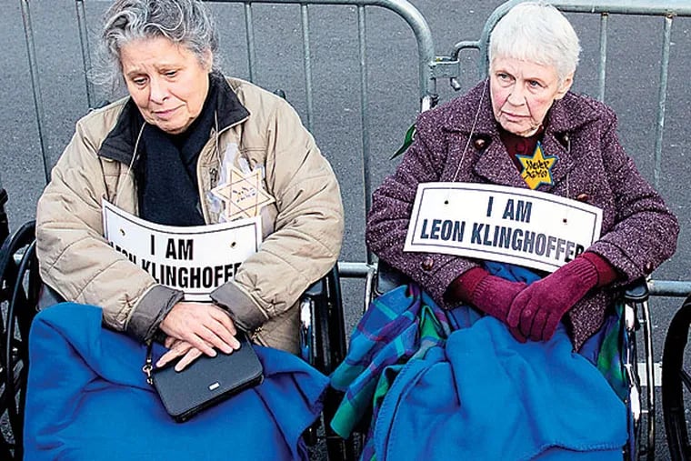 Protesters, some in wheelchairs, gather at Lincoln Center to demonstrate against the Metropolitan Opera’s production of “The Death of Klinghoffer.” (CRAIG RUTTLE / AP)