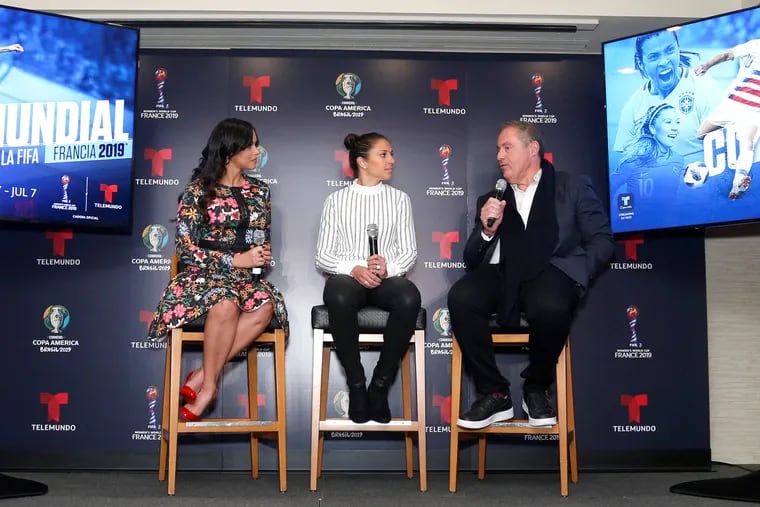 Telemundo's Ana Jurka (left) and Andrés Cantor (right) hosted U.S. women's soccer team star Carli Lloyd at the network's presentation of its women's World Cup plans.