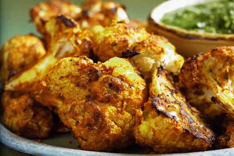 Tandoori Cauliflower With Mint Chutney, from “Fire It Up” by Andrew Schloss and David Joachim; photo by Alison Miksch.