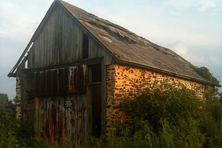 The Swede's Run barn before renovations. Residents heard talk of demolition and banded together to rescue it. (JULIE MARAVICH)