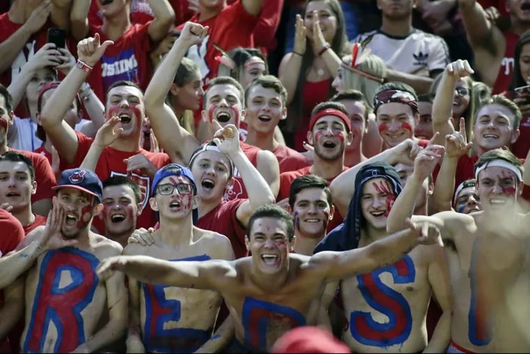 Neshaminy fans get excited during the game against visiting Roman Catholic Friday night.