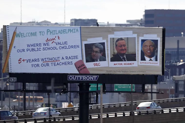 The Philadelphia Board of Ethics said this billboard, funded with donations raised by Central High School teacher George Bezanis, made him a lobbyist who must register with the city or face a fine.