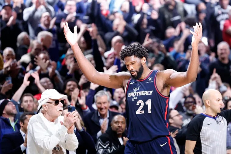 Sixers center Joel Embiid acknowledges the crowd after scoring 70 points against the San Antonio Spurs on Monday night.