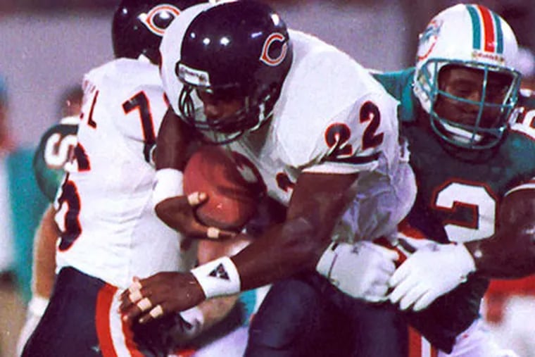 The Chicago Bears' Dave Duerson (center) committed suicide last year after having trouble with words and remembering names. ASSOCIATED PRESS