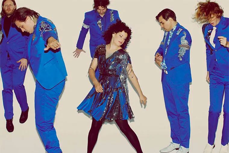Arcade Fire perform at the Wells Fargo Center on March 17.