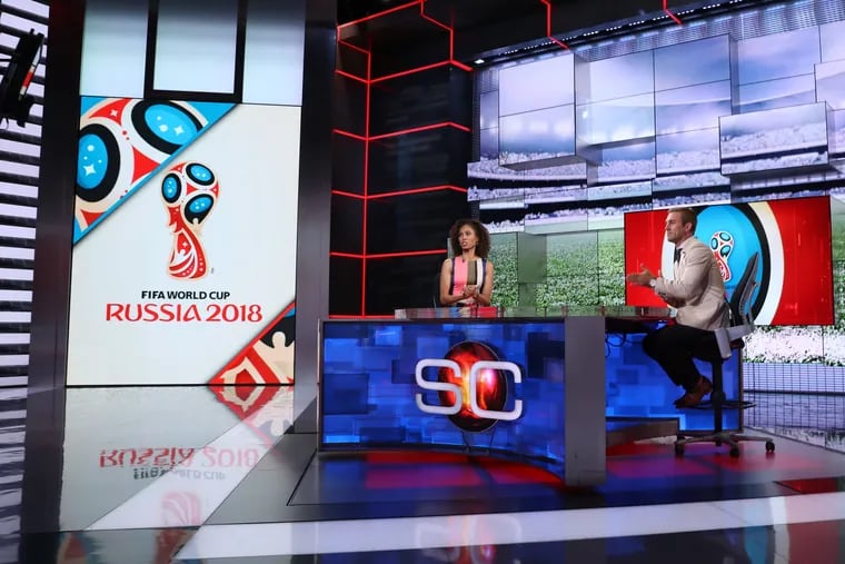 ESPN soccer analyst Taylor Twellman (right) with Sage Steele on the SportsCenter set.