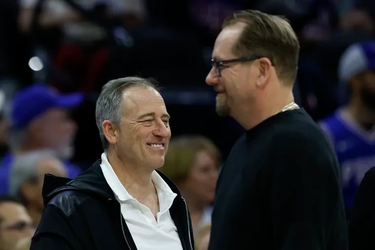 Sixers managing partner Josh Harris (left) with coach Nick Nurse during a game against the Brooklyn Nets on April 14.