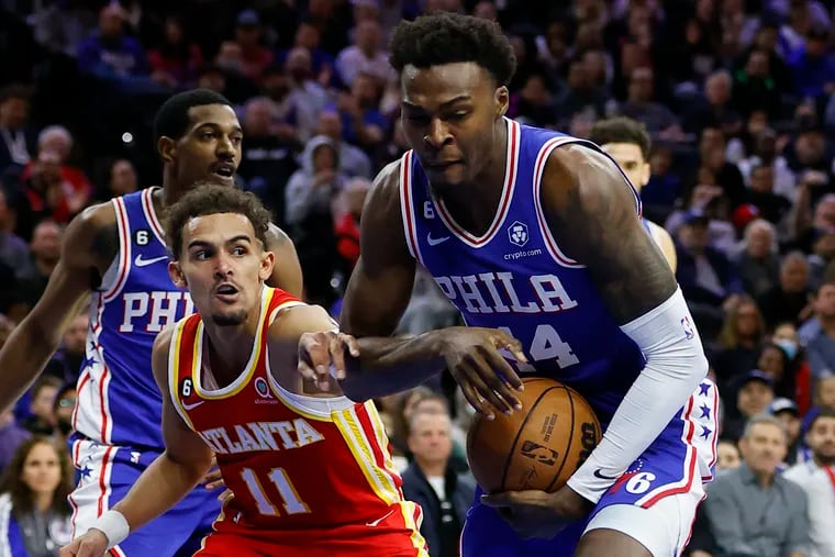 Sixers forward Paul Reed grabs the basketball during a game against the Atlanta Hawks in November.