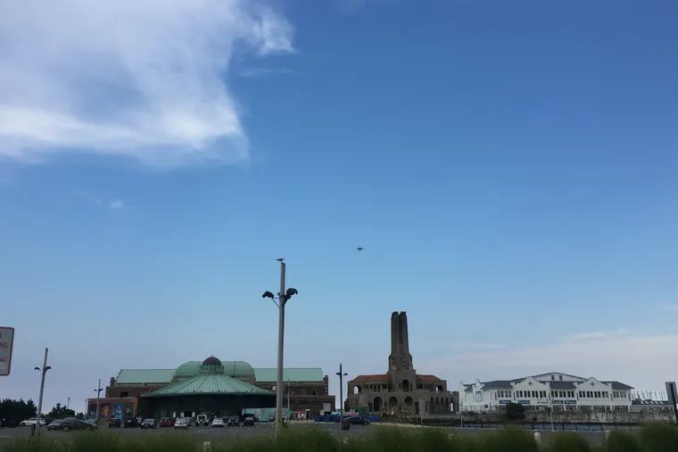 FILE - A 5-alarm fire broke out at about 11:30 a.m. Saturday at the Dunes Boardwalk Cafe building in Ocean Grove, New Jersey, which houses several seasonal businesses and was apparently unoccupied at the time.
