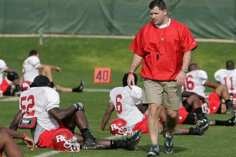 Rutgers coach Greg Schiano and his football staff are holding football camps for high school players. (AP Photo / Will Powers)