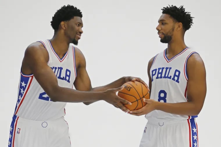 Sixers centers Joel Embiid (left) and Jahlil Okafor during a NBA Photos session in September 2016.