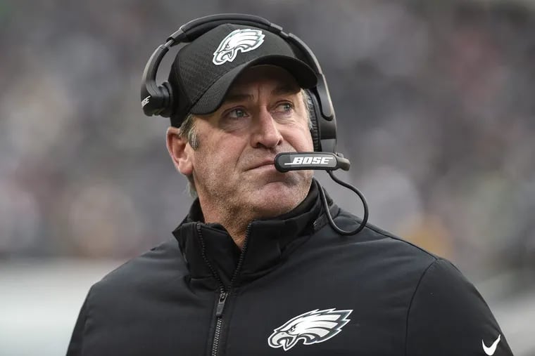 Eagles head coach Doug Pederson looks up at the scoreboard in the 4th quarter in the game against the Cowboys at Lincoln Financial Field December 31, 2017. Eagles lost 6-0.