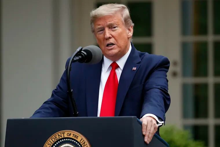 President Donald Trump speaks about the coronavirus in the Rose Garden of the White House, Tuesday, April 14, 2020, in Washington.