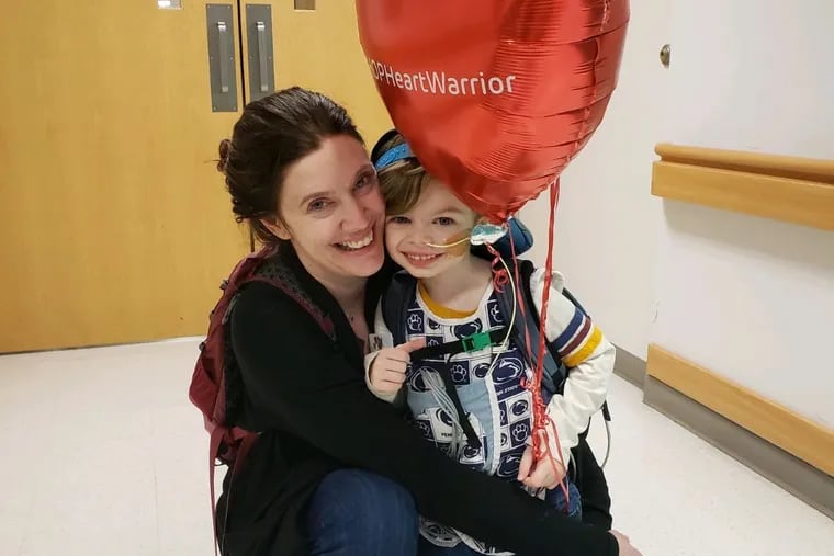 Zach Reesey and his mom Sarah pose for a photo at CHOP. Zach has Kawasaki disease, a rare illness that causes inflammation of the blood vessels and can lead to serious heart problems.