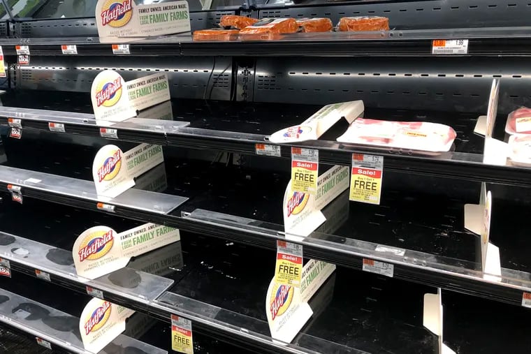 Empty meat shelves at the Acme in the Haddon Commons in Haddon Township in March.