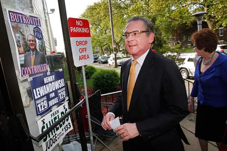 Philadelphia City Controller Alan Butkovitz and wife Theresa arrive at polling place Ward 53 Division 11 inside the St. Thomas Indian Orthodox school at 1009 Unruh Ave in northeast Philadelphia on Tuesday, May 21, 2013. ( ALEJANDRO A. ALVAREZ / STAFF PHOTOGRAPHER )