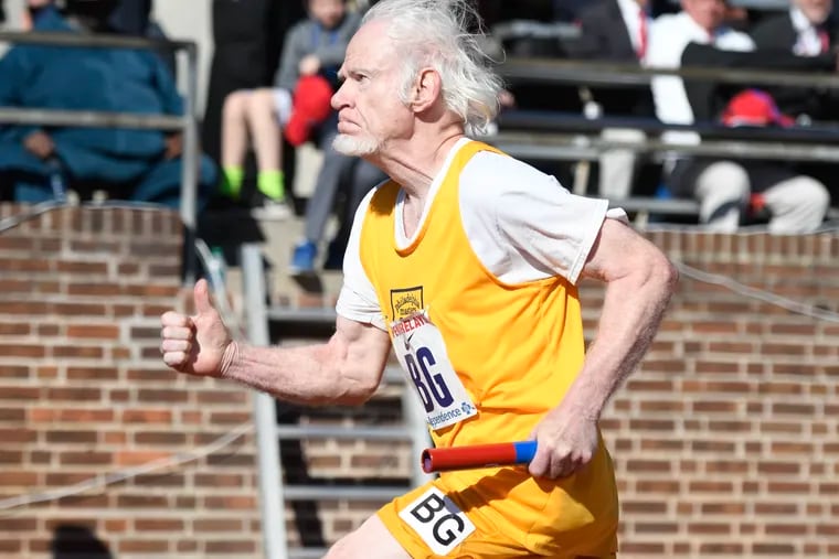 William Rhoad runs the anchor leg for the Philadelphia Masters 75-and-over 4x400-meter relay team at the 2019 Penn Relays.