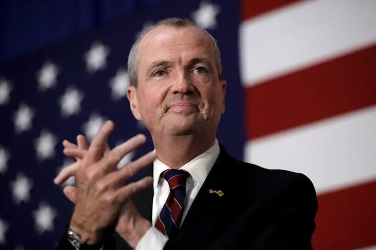 Phil Murphy claps while talking to supporters during a Democratic primary election watch party at the Robert Treat Hotel, Tuesday, June 6, 2017, in Newark, N.J. Murphy won the primary and will face New Jersey Lt. Gov. Kim Guadagno, who won the Republican primary. (AP Photo/Julio Cortez)