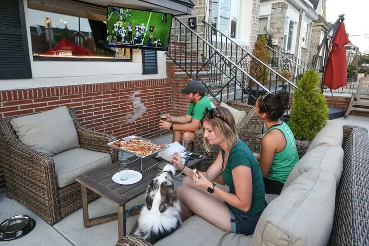 In a 2019 photo, fans watch a game outside the Philadium, 1631 Packer Ave.