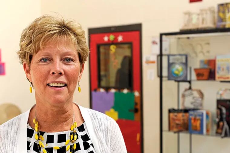 Kathleen Assini is the 2013-2014 New Jersey Teacher of the Year, and now has won a national award.  ( TOM GRALISH / Staff Photographer )
