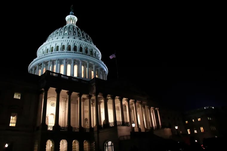 In this Feb. 5, 2019, file photo lights illuminate the U.S. Capitol dome in Washington.