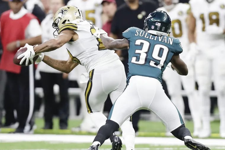 Eagles defensive back Chandon Sullivan goes after New Orleans Saints wide receiver Tre'Quan Smith during this past Sunday's game.
