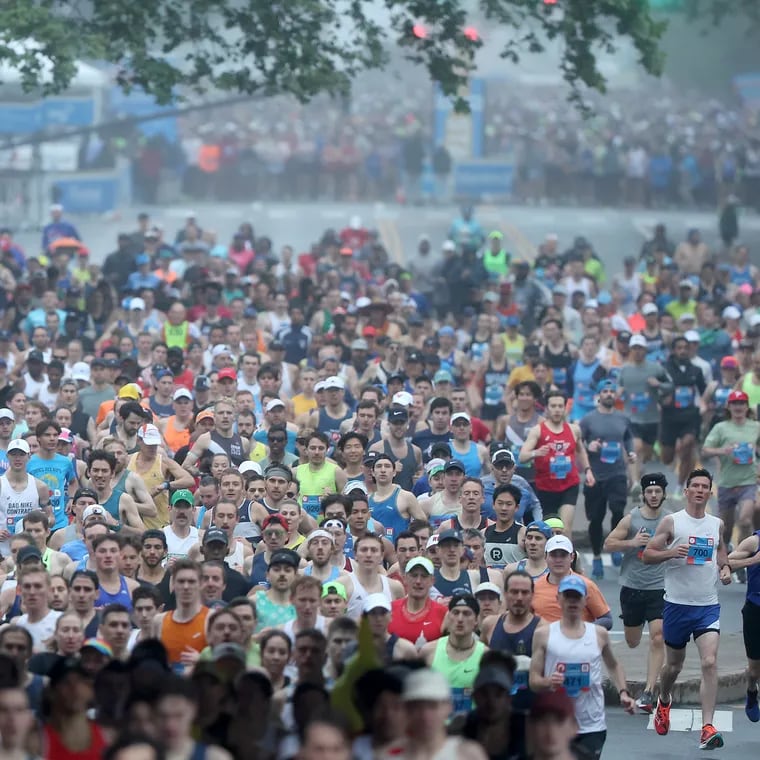The first wave of runners leave the starting line during the 2024 Independence Blue Cross Broad Street Run in Philadelphia on Sunday.