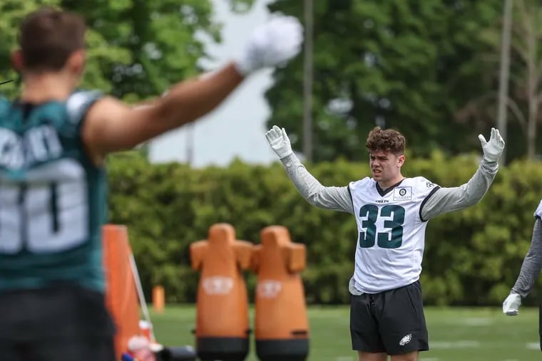 Eagles rookie and second round draft pick Cooper DeJean, defensive back out of Iowa, warms up during rookie minicamp at the NovaCare Complex in Philadelphia on Friday, May 3, 2024.