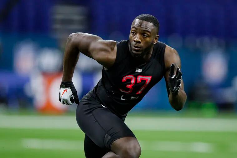 Colorado linebacker Davion Taylor, who was taken in the third round of the draft Friday by the Eagles, is shown running a drill at the NFL scouting combine in Indianapolis in late February.