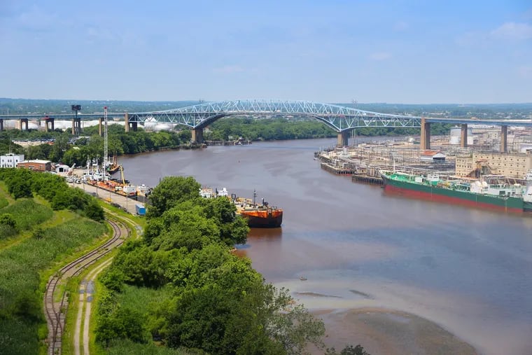 Schuylkill River with Platt Bridge and industrial refinery, from the 2018 Report Card for Pennsylvania's Infrastructure.